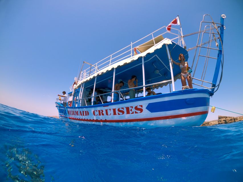 Bugibba: Scenic Sunset Cruise with Blue Lagoon Swim Stop - Sailing North With Reggae on Board