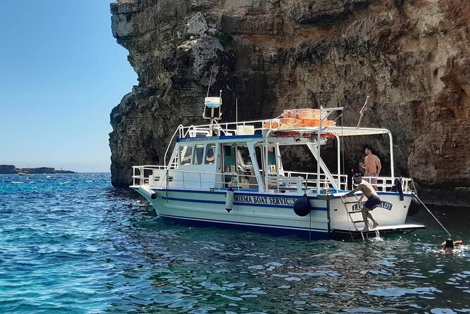 Comino Blue Lagoon and Gozo Private Boat Charter: Lucky Lady Boat - Crystal Lagoon and Comino’s movie-set caves