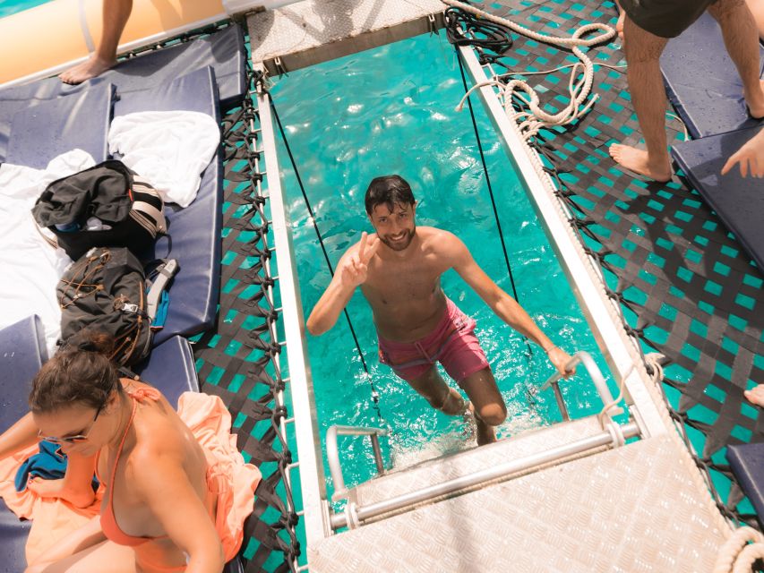 Comino: Blue Lagoon Catamaran Cruise with Lunch and Open Bar - Sailing south toward Comino