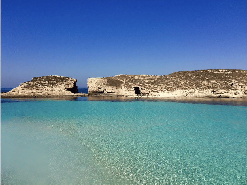 Comino's Best in a Flash: Caves, Coves & Beaches Boat Tour - Crystal Lagoon offers a quieter pause
