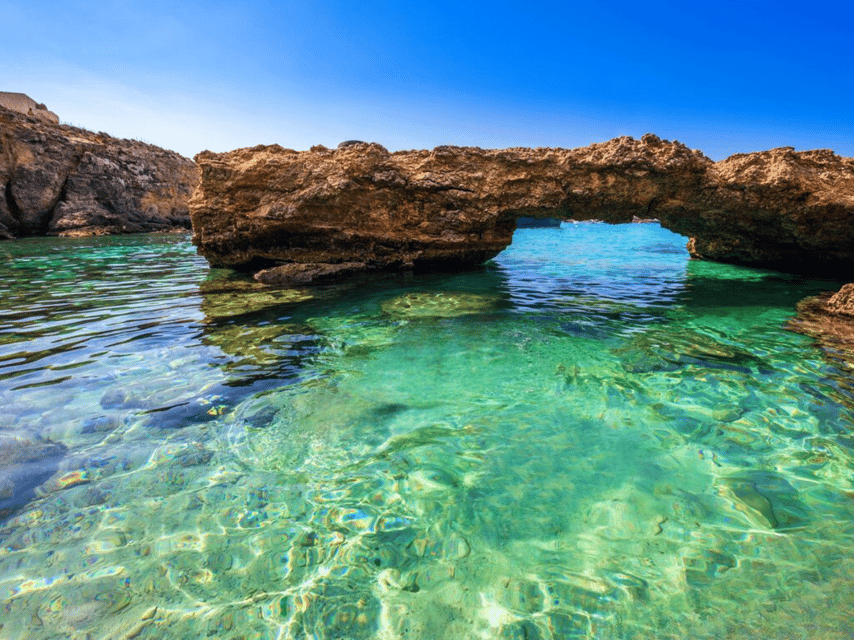 From Malta/Gozo: Comino & Crystal Lagoon Private Boat Trip - A short private route through Comino