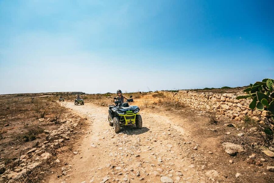 From Malta: Gozo & Comino Quad Bike & Boat Tour with Lunch - Country tracks, Wied il-Mielaħ, and Wied il-Għasri