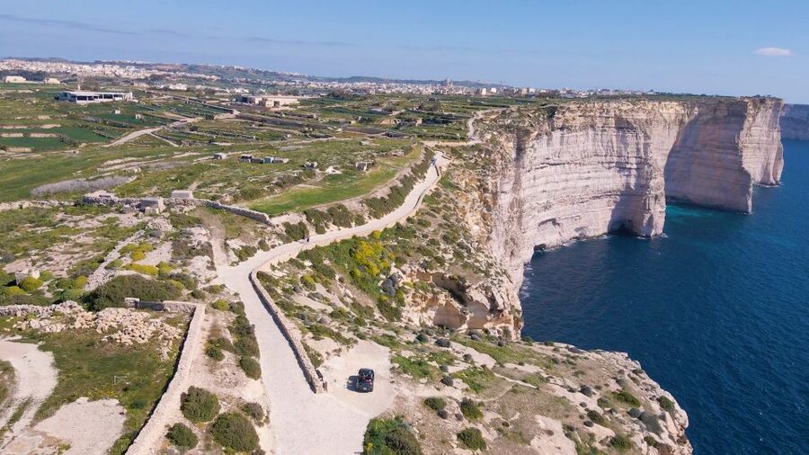 From Malta: Self-Driving E-Jeep Guided Tour in Gozo - Caves, towers, and viewpoints toward Comino