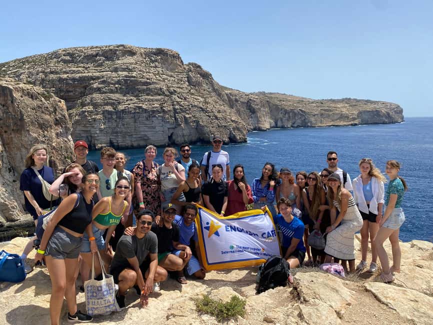 From Sliema: Blue Grotto Trip - Including Boat Cave Tour - Walking toward Xutu Tower
