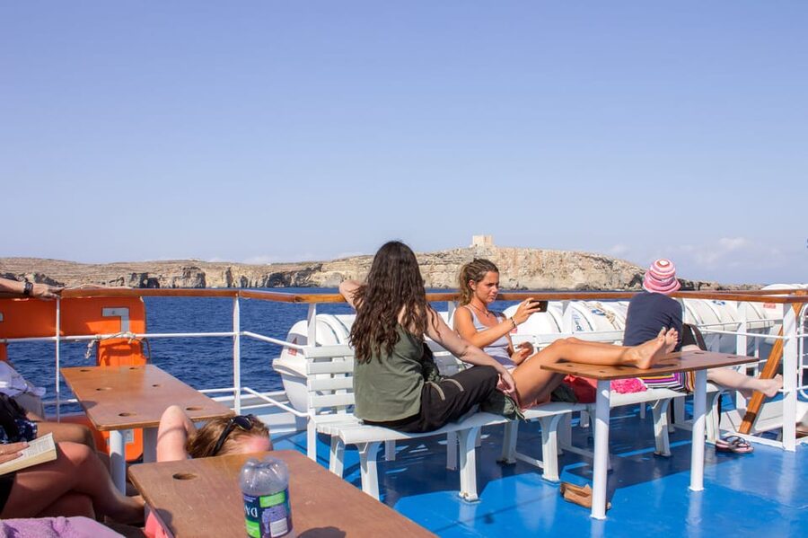From Sliema: Full-Day Cruise to Comino and the Blue Lagoon - Shore time, rocks, and what to bring