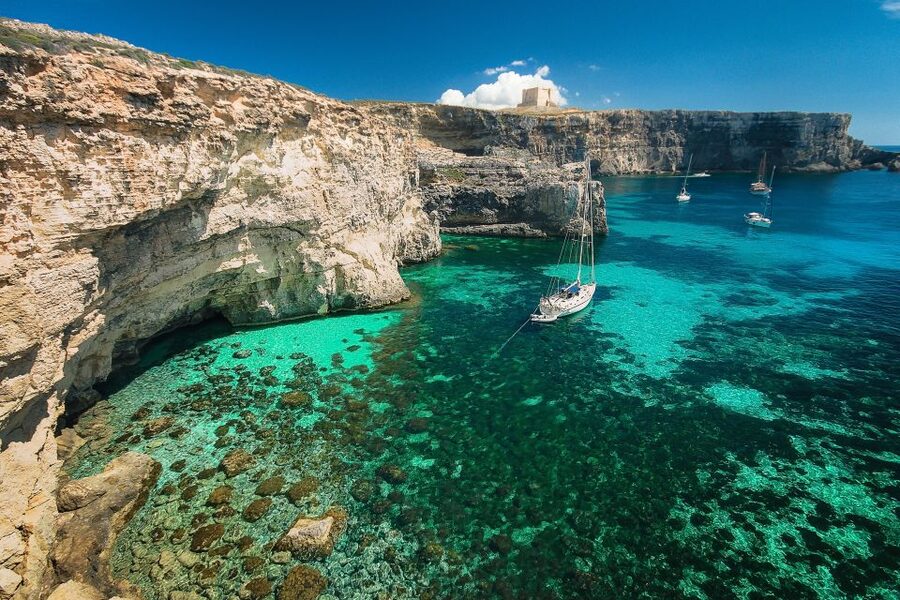 From Sliema: Gozo, Comino & The Blue Lagoon Boat & Bus Tour - Comino’s quieter side and the return through the caves