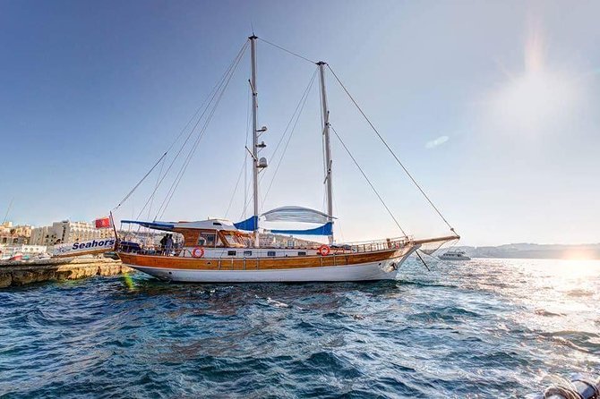 Gozo Blue Lagoon and Sea Caves Full Day Cruise Tour - Sea caves and rock formations along Comino