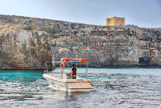 Half Day Blue Lagoon, Comino and Gozo Private Guided Boat Cruise - Captains, music, and the relaxed side of the trip