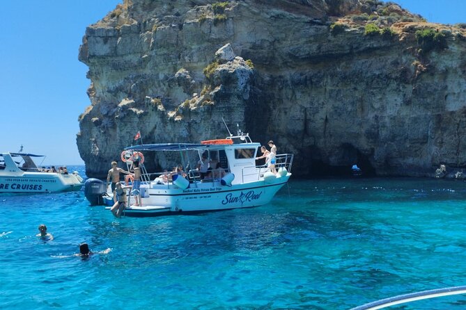 Half Day Blue Lagoon, Comino, Gozo and Malta Private Boat Trip - Blue Lagoon: beautiful, popular, and rarely peaceful
