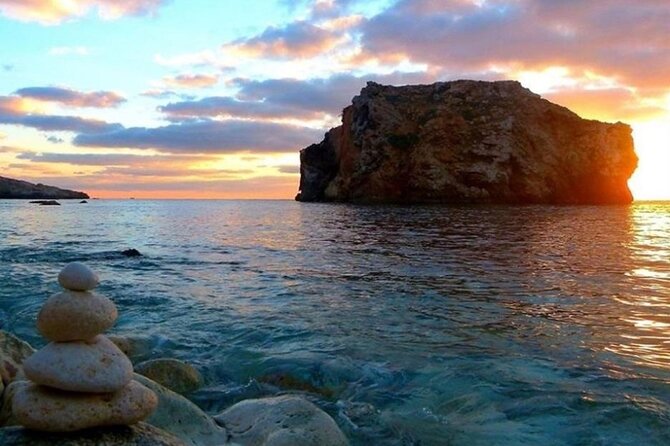 Half Day Malta Tour to Gozo Comino and Blue Lagoon Caves - Blue Lagoon: iconic water, serious crowds