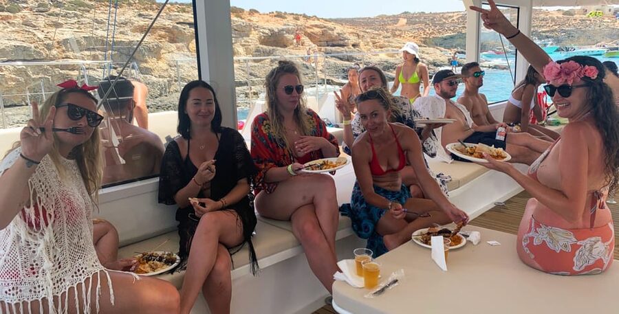 Malta: Blue Lagoon Evening Catamaran Cruise - Swimming access is one of the boat’s best details
