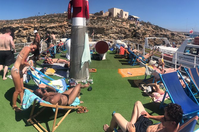 Malta: Comino, Blue Lagoon & Caves - swim, snorkel & slide - Starting at Bugibba Jetty at 10:00