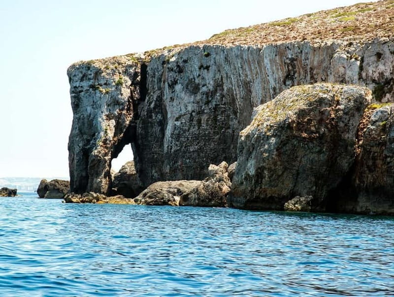 Malta: Comino, Gozo, Blue & Crystal Lagoon, and Caves Cruise - Blue Lagoon: beautiful water, busy shore
