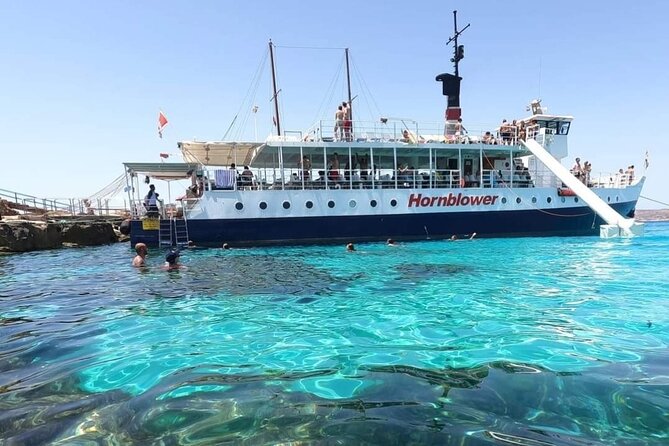 Malta: Comino, Gozo, Blue Lagoon, Crystal Lagoon and Caves Tour - The return cruise through Comino’s south channel