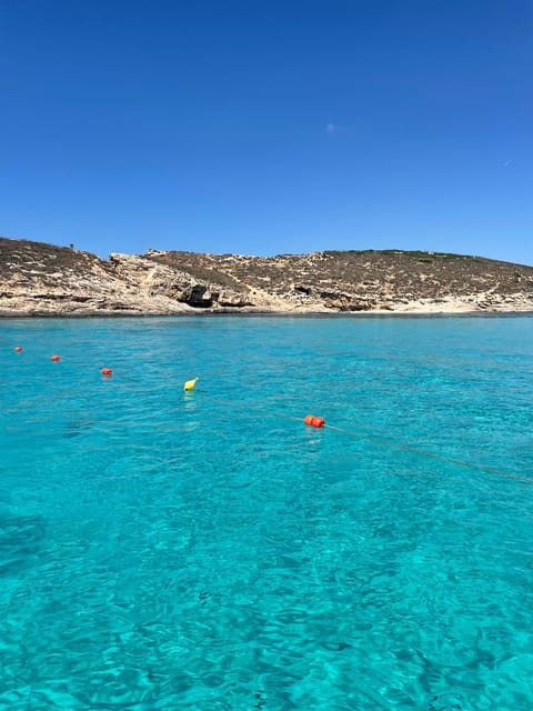 Malta:Gozo,Comino,Crystal/BlueLagoon&Caves Private Boat trip - George and the private-group experience