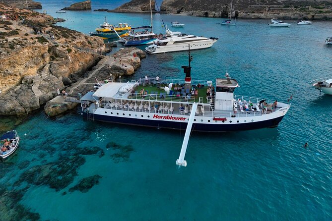 Malta Sunset Boat Tour: Bugibba to Comino Blue Lagoon Cruise - The northern coast from Bugibba to Comino