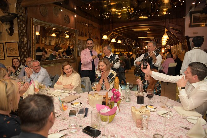 Maltese Traditional Dinner and Folklore Show with Transfers - Arriving at a private table