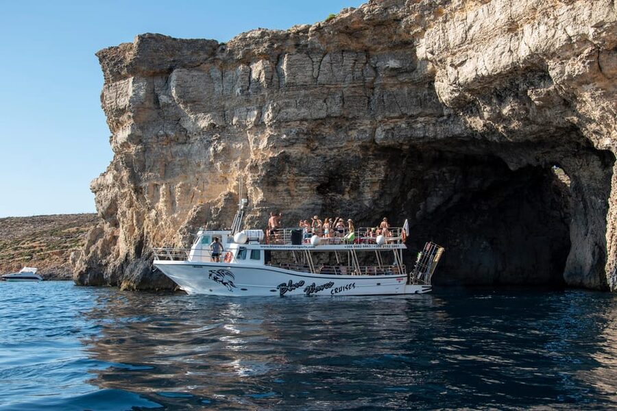 Mellieha: Comino, Crystal & Blue Lagoon 2 Bay Evening Cruise - Going ashore on Comino
