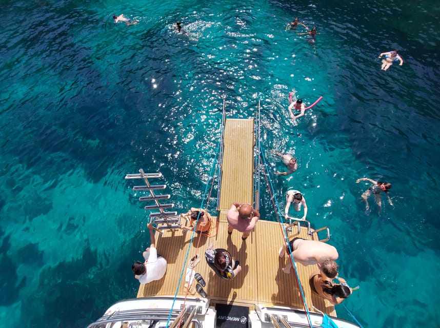 Mellieha: Two Bay Evening Cruise Including The Blue Lagoon - What to bring for a comfortable trip