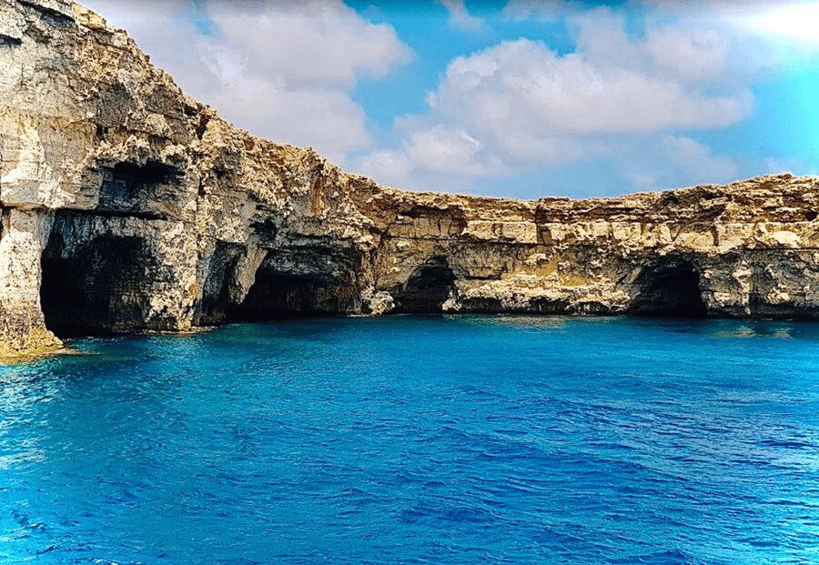 Party Prowl: Crystal Lagoon, Gozo, Santa Maria Caves, Malta - The party setup: music, shade, and your own supplies