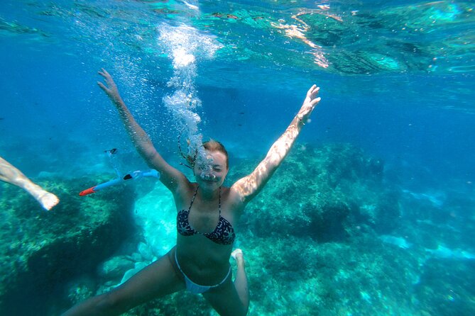 Private Boat Tour to Blue Lagoon Comino Caves and Gozo - Caves, watchtower views, and what you see from the boat
