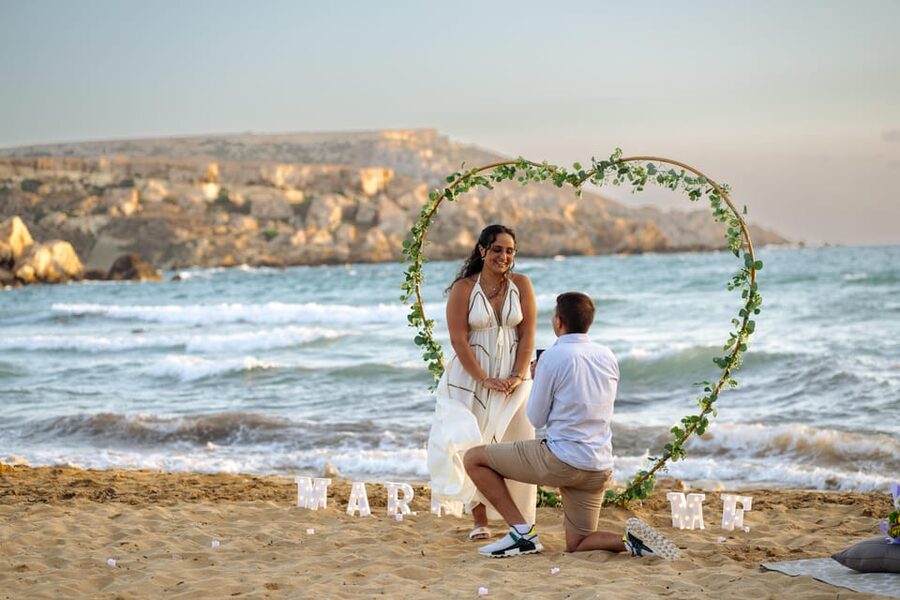 Proposal Photoshoot with Professional Photographer in Malta - Choosing between the beach arch and sunset picnic