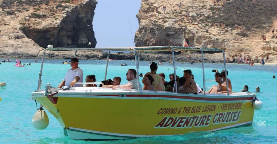 Sliema: Boat Trip to Comino Blue Lagoon, Gozo, and Caves - Leaving Sliema and crossing toward Comino