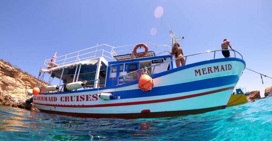 St Paul's Bay: Comino, Blue Lagoon, Gozo, & Caves Boat Tour - The first hour on the Mediterranean